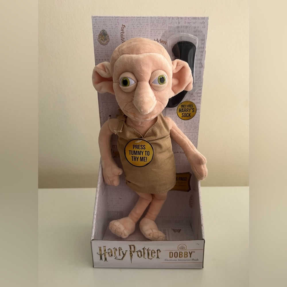 Dobby electronic interactive plush. Squeeze his tummy to hear 10 unique phrases.